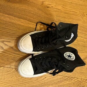 Black and white higher top converse